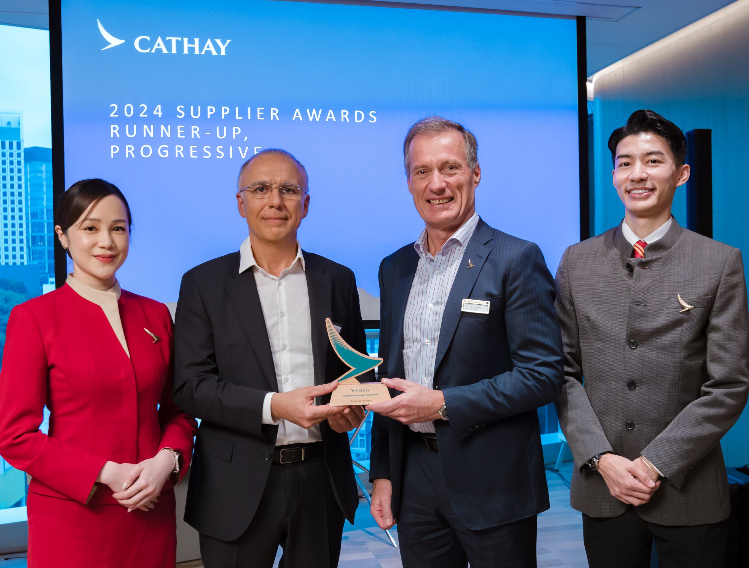 Chris Kempis, Director Flight Operations, Cathay Pacific Airways hands the award to Arvand Varahram, Managing Director, prodefis